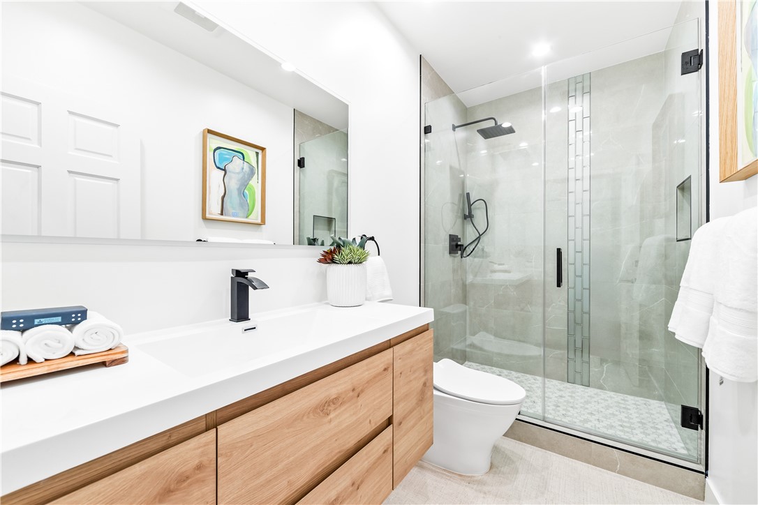 541 4th Street Manhattan Beach, CA 90266 - Photo 17 of 45 a bathroom with a sink a toilet and shower