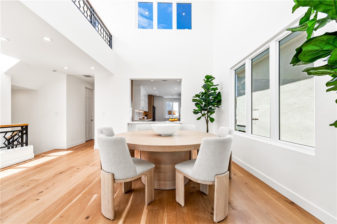 541 4th Street Manhattan Beach, CA 90266 - Photo 19 of 45 a view of a dining room with furniture and a potted plant