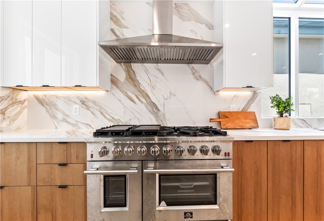 541 4th Street Manhattan Beach, CA 90266 - Photo 26 of 45 a stove top oven sitting inside of a kitchen