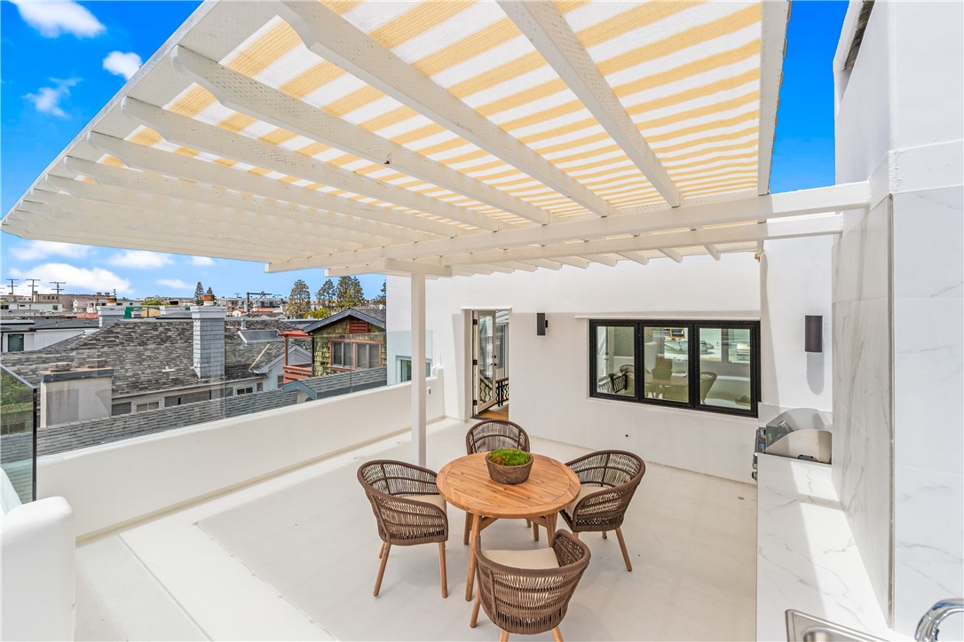 541 4th Street Manhattan Beach, CA 90266 - Photo 39 of 45 a view of a dining room with furniture window and outside view