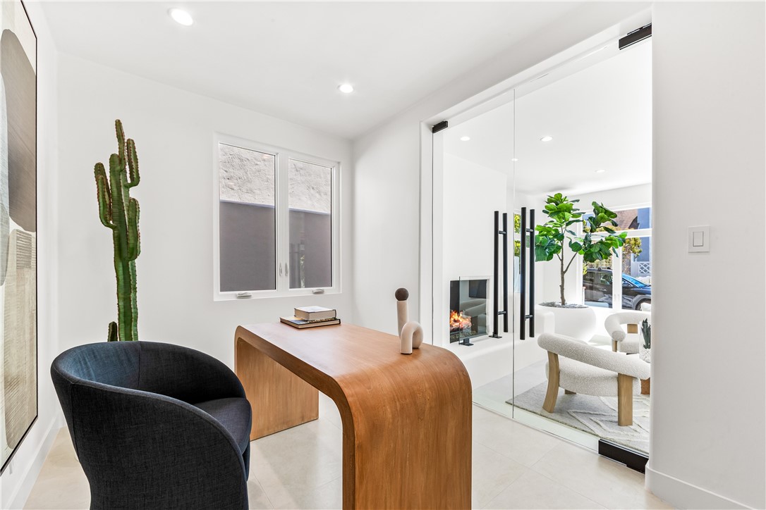 541 4th Street Manhattan Beach, CA 90266 - Photo 8 of 45 a bedroom with a bed and a couch