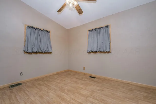 a view of room and painting on the wall