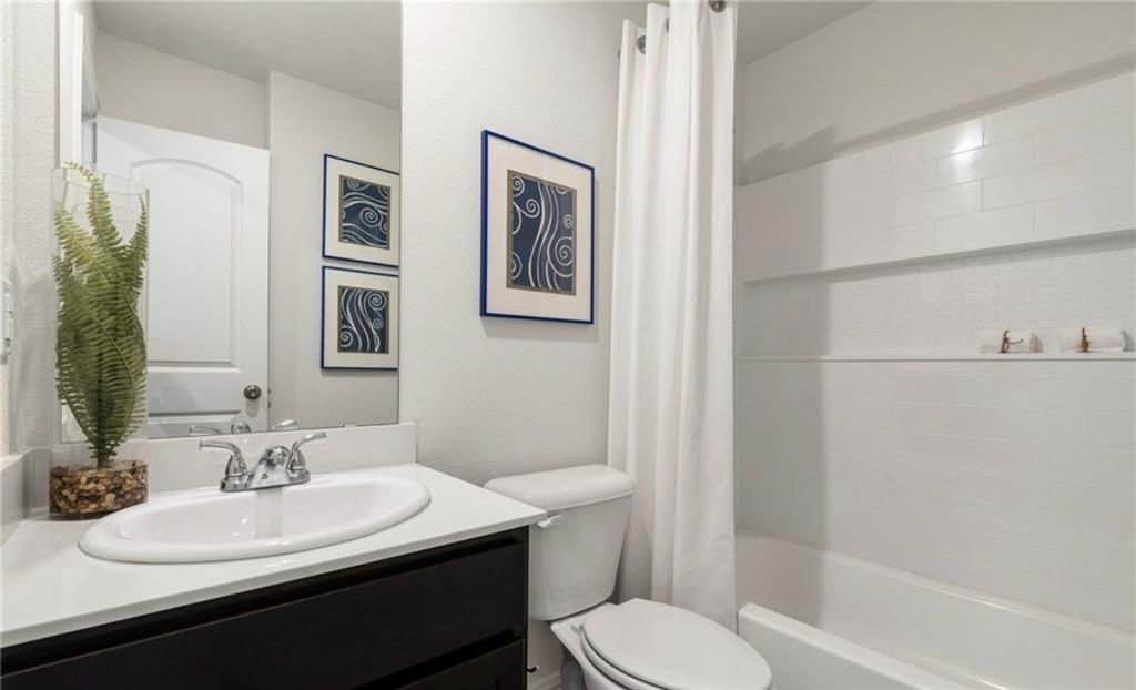 812 South 22nd Street Temple, TX 76501 - Photo 20 of 34 a bathroom with a sink toilet and shower