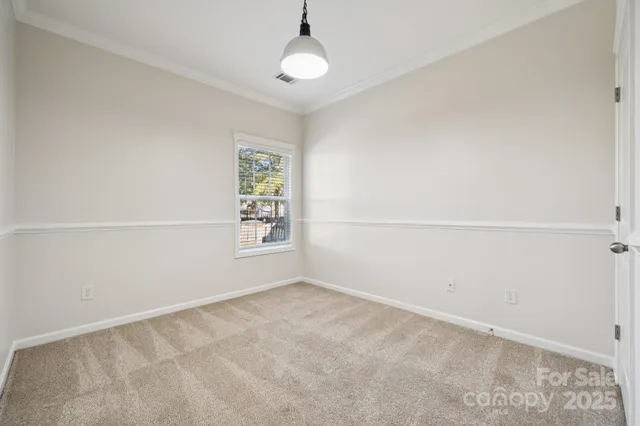 an empty room with a empty space and a window