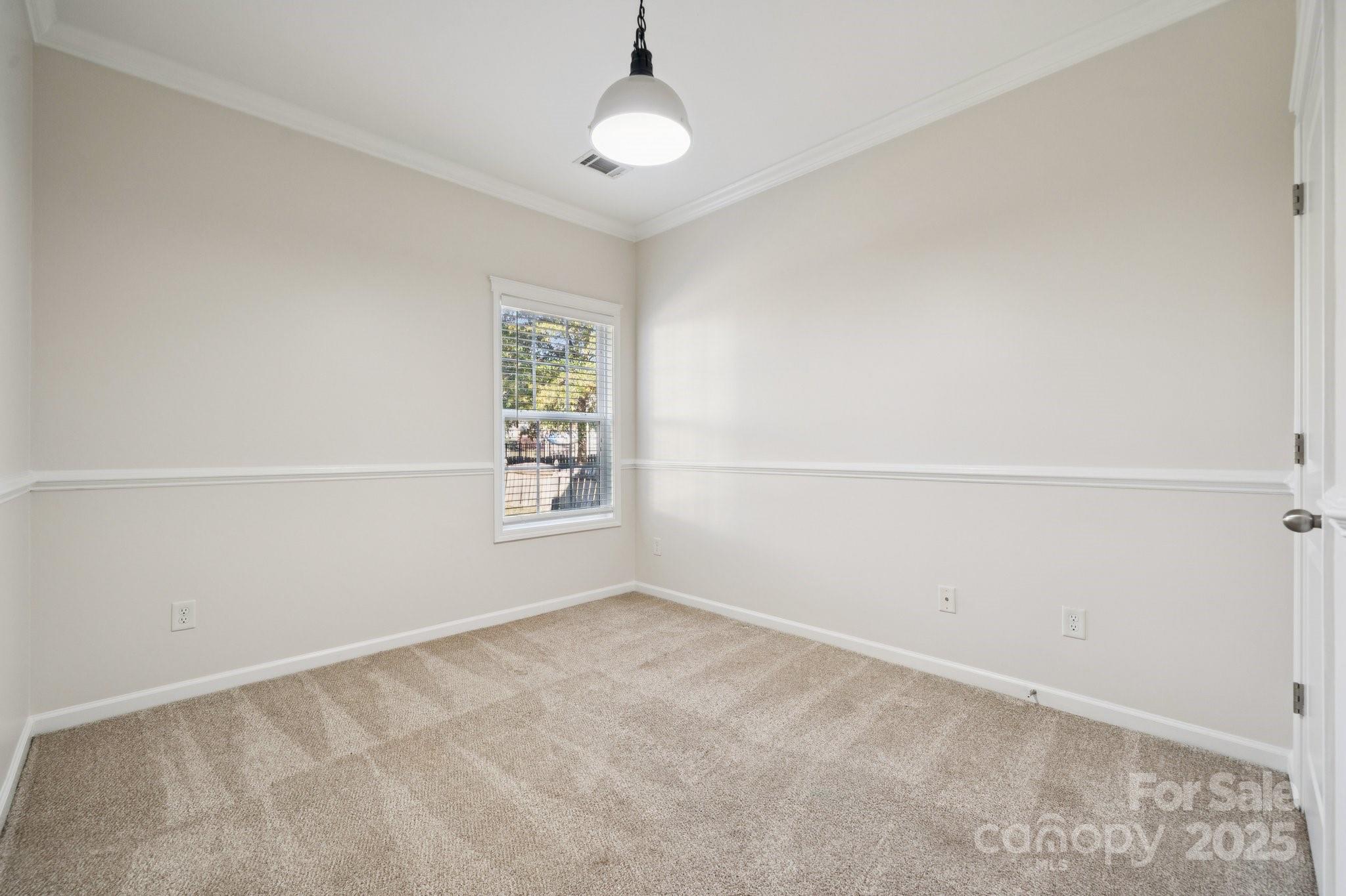 2015 Terrapin Street Indian Trail, NC 28079 - Photo 12 of 28 an empty room with a empty space and a window