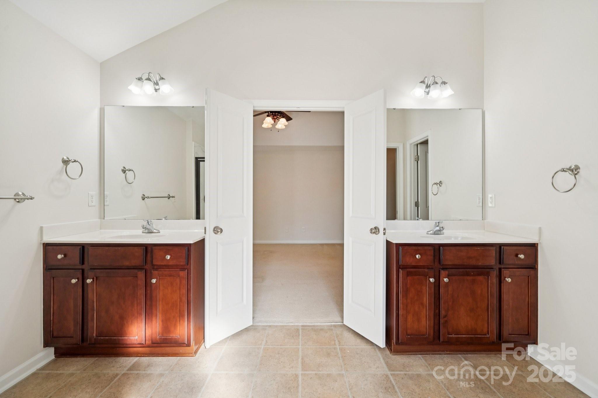 2015 Terrapin Street Indian Trail, NC 28079 - Photo 16 of 28 a spacious bathroom with a sink and a mirror
