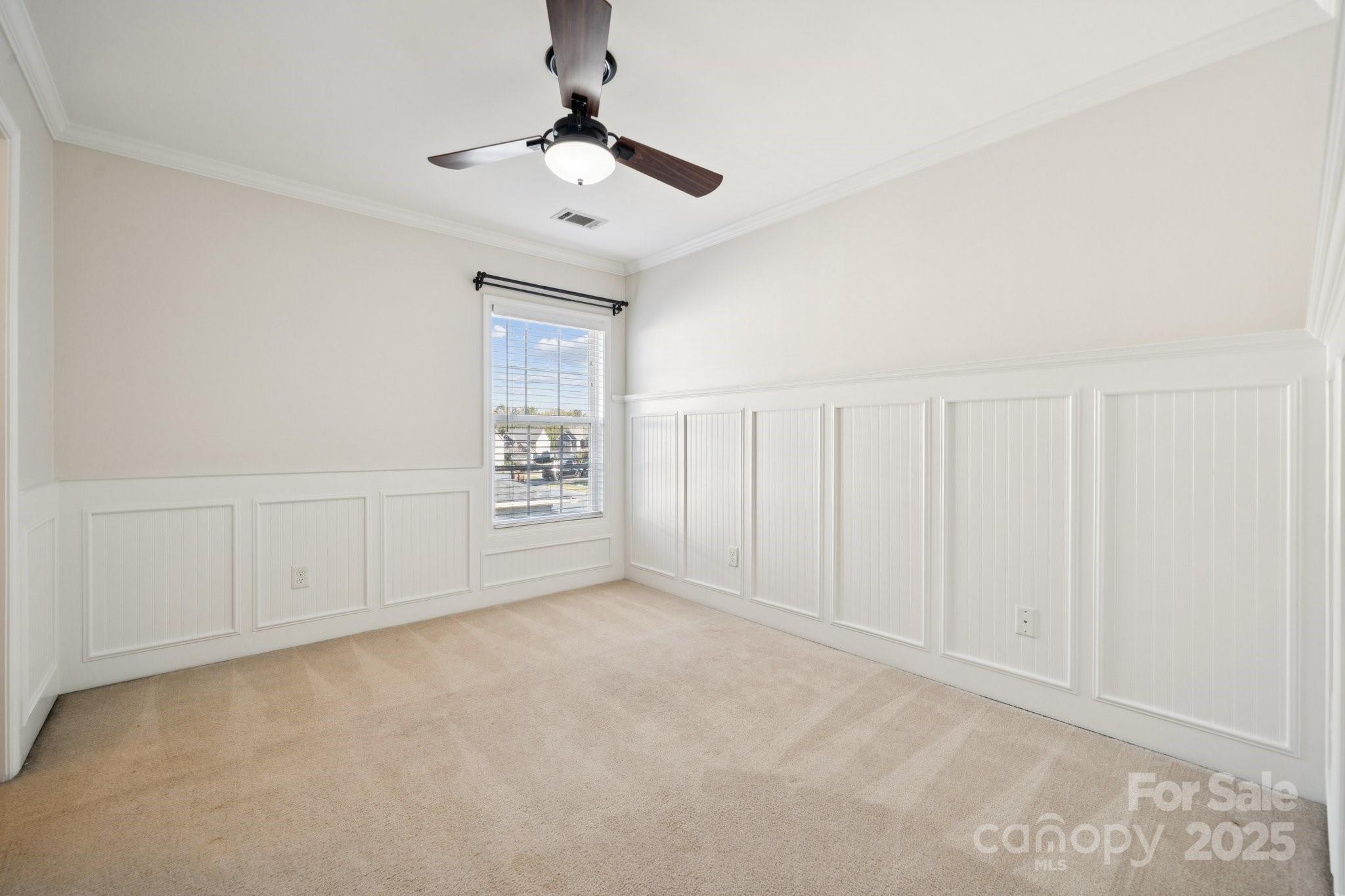 2015 Terrapin Street Indian Trail, NC 28079 - Photo 19 of 28 an empty room with chandelier fan
