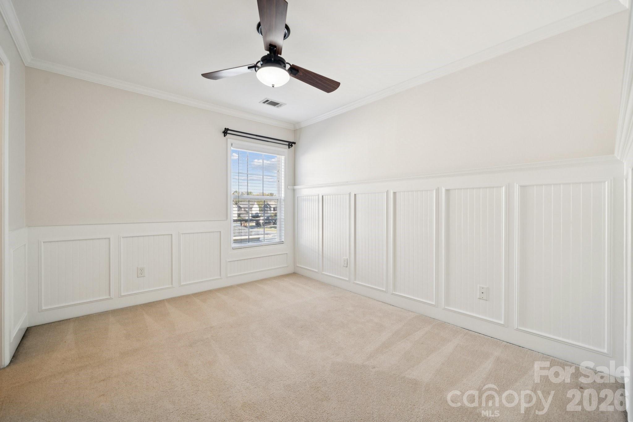 2015 Terrapin Street Indian Trail, NC 28079 - Photo 23 of 30 an empty room with chandelier fan