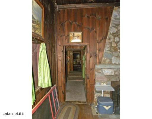 111 Rowe Road Charlemont, MA 01339 - Photo 7 of 17 a front view of a house with a door