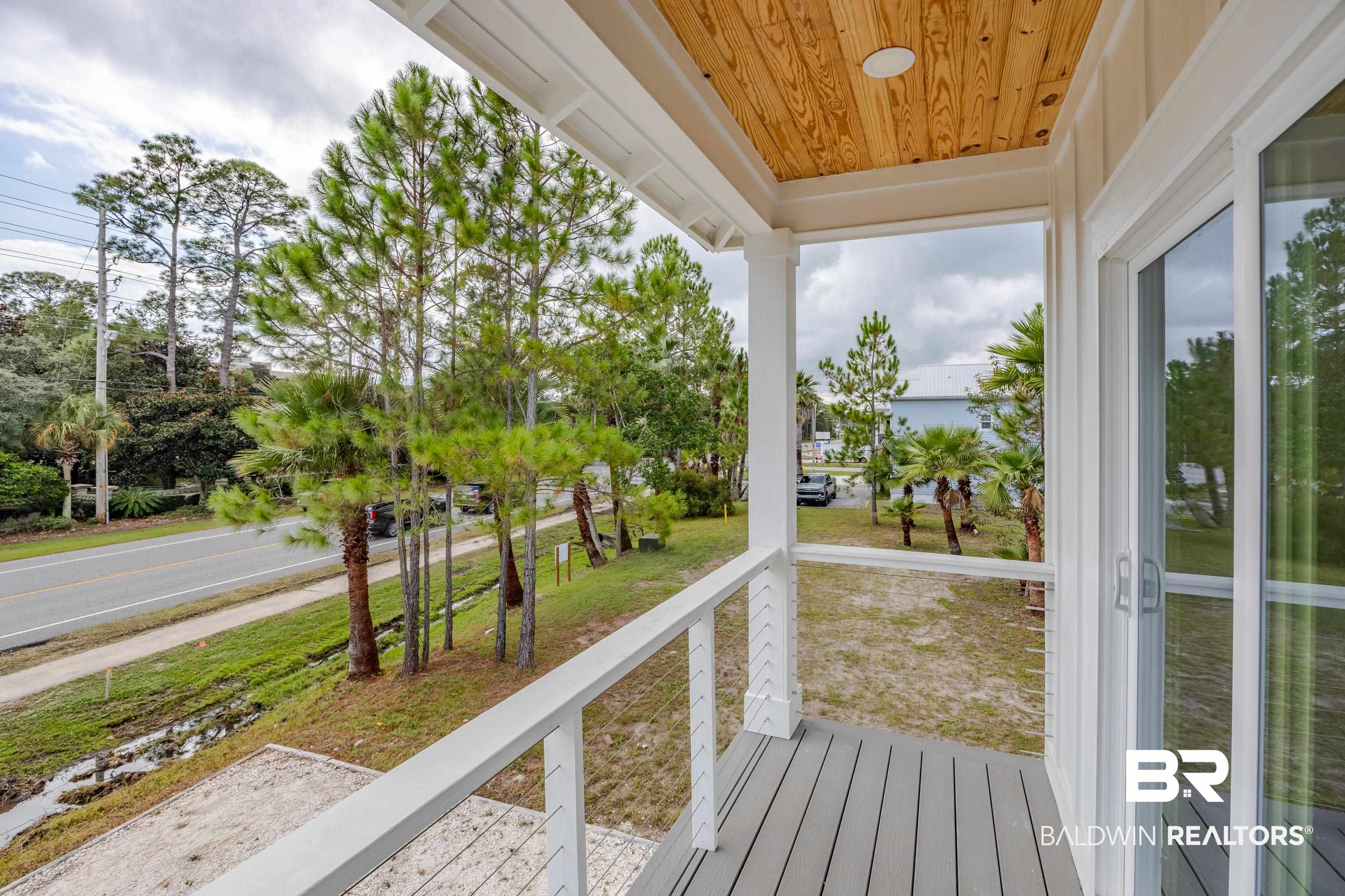 27591 Canal Road Orange Beach, AL 36561 - Photo 50 of 51 View of unfurnished sunroom
