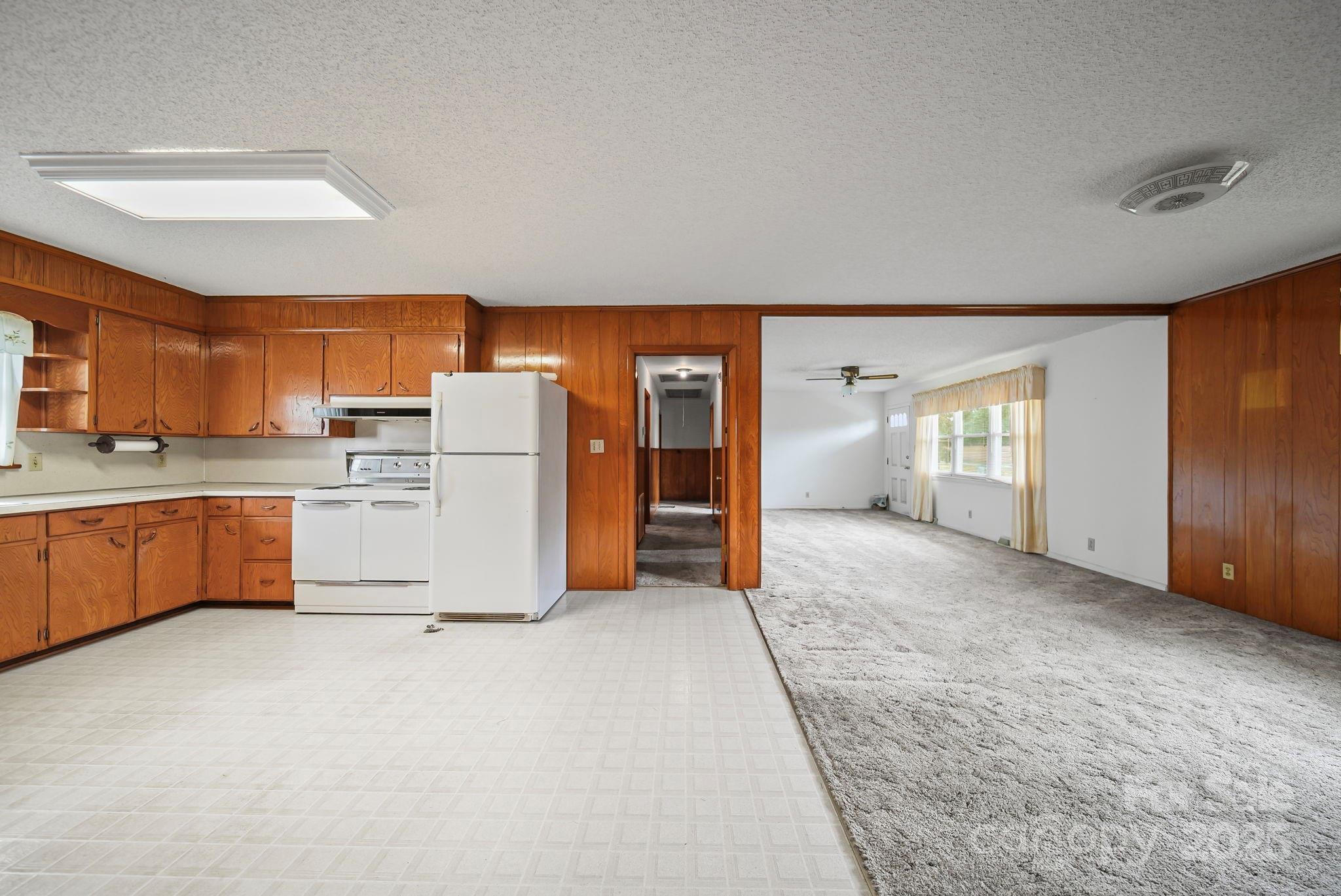 3710 Camden Road Marshville, NC 28103 - Photo 21 of 38 a view of kitchen with refrigerator and cabinets