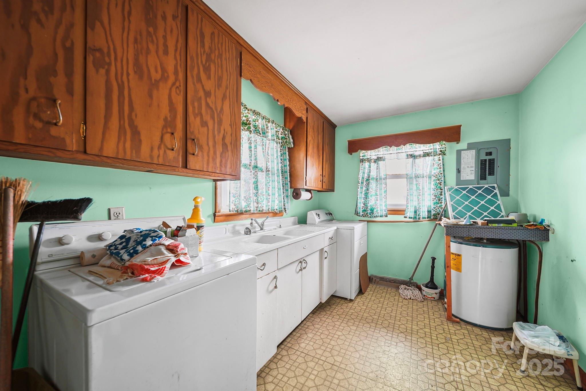3710 Camden Road Marshville, NC 28103 - Photo 23 of 38 a kitchen that has a sink and a stove in it