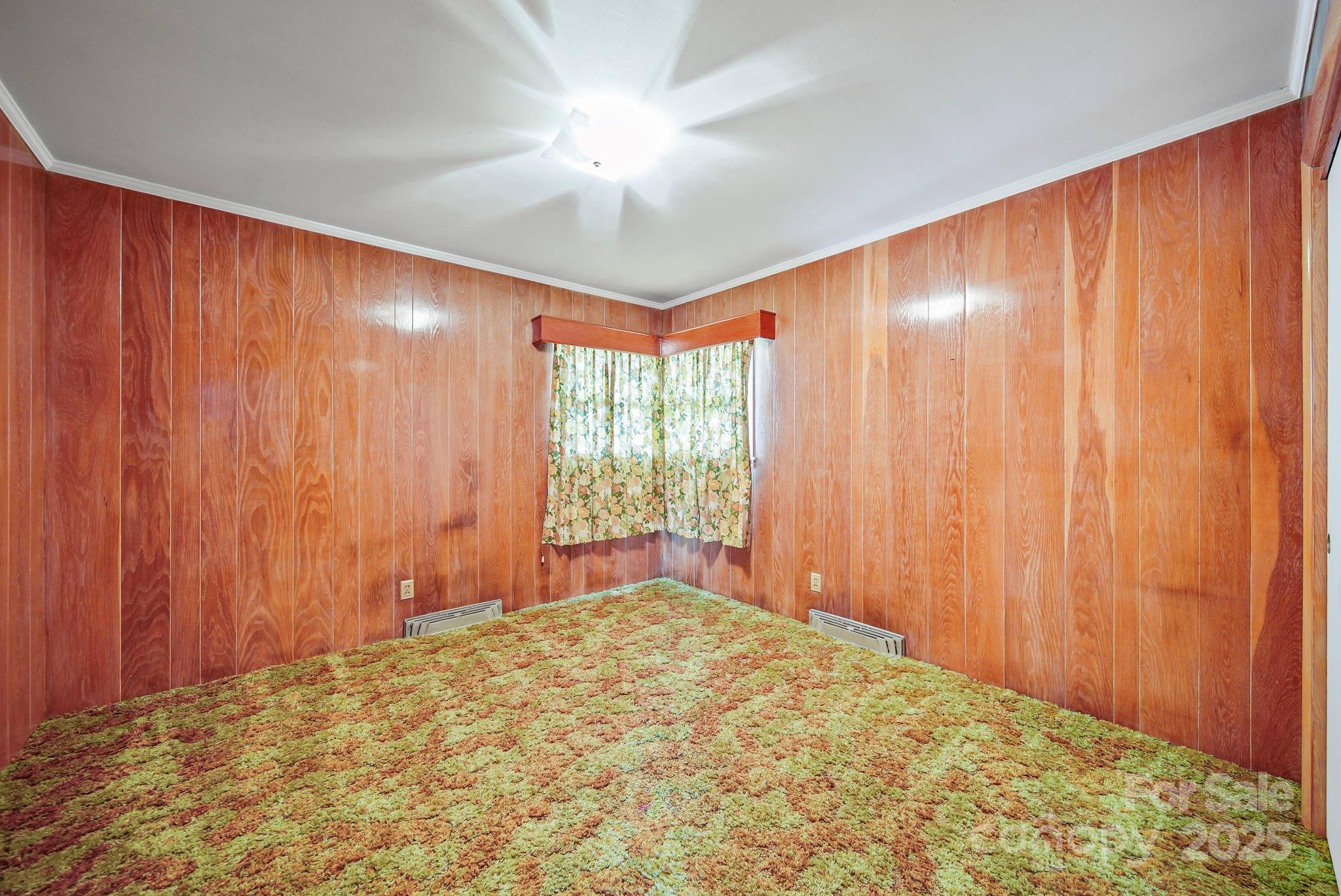 3710 Camden Road Marshville, NC 28103 - Photo 26 of 38 a view of an empty room with a window and door