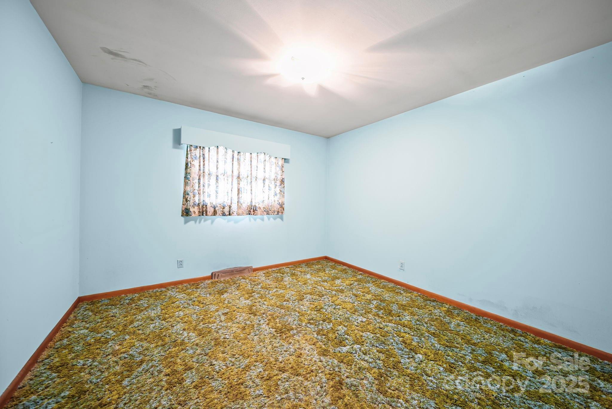 3710 Camden Road Marshville, NC 28103 - Photo 28 of 38 an empty room with windows