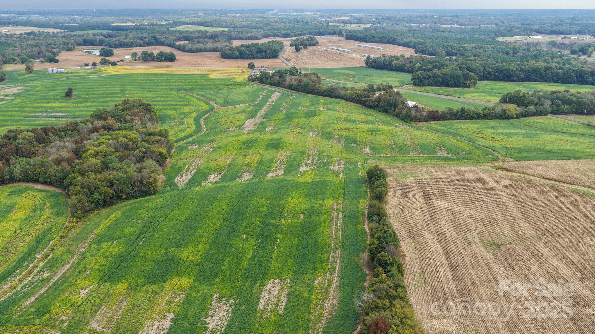 3710 Camden Road Marshville, NC 28103 - Photo 36 of 38 an aerial view of field with residential houses