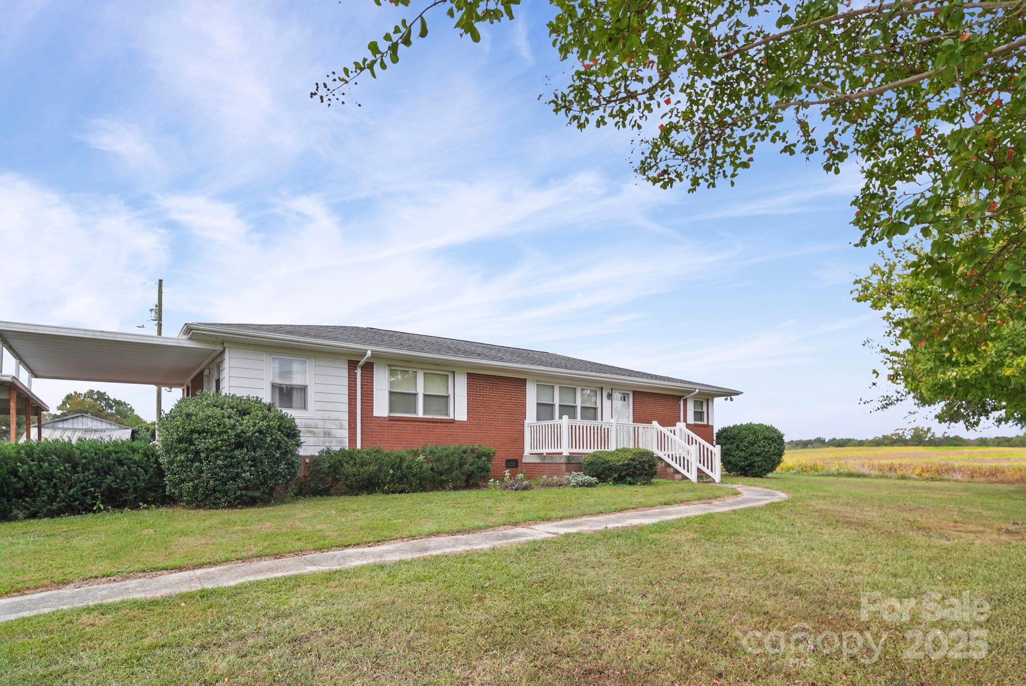 3710 Camden Road Marshville, NC 28103 - Photo 38 of 38 a view of a house with a backyard