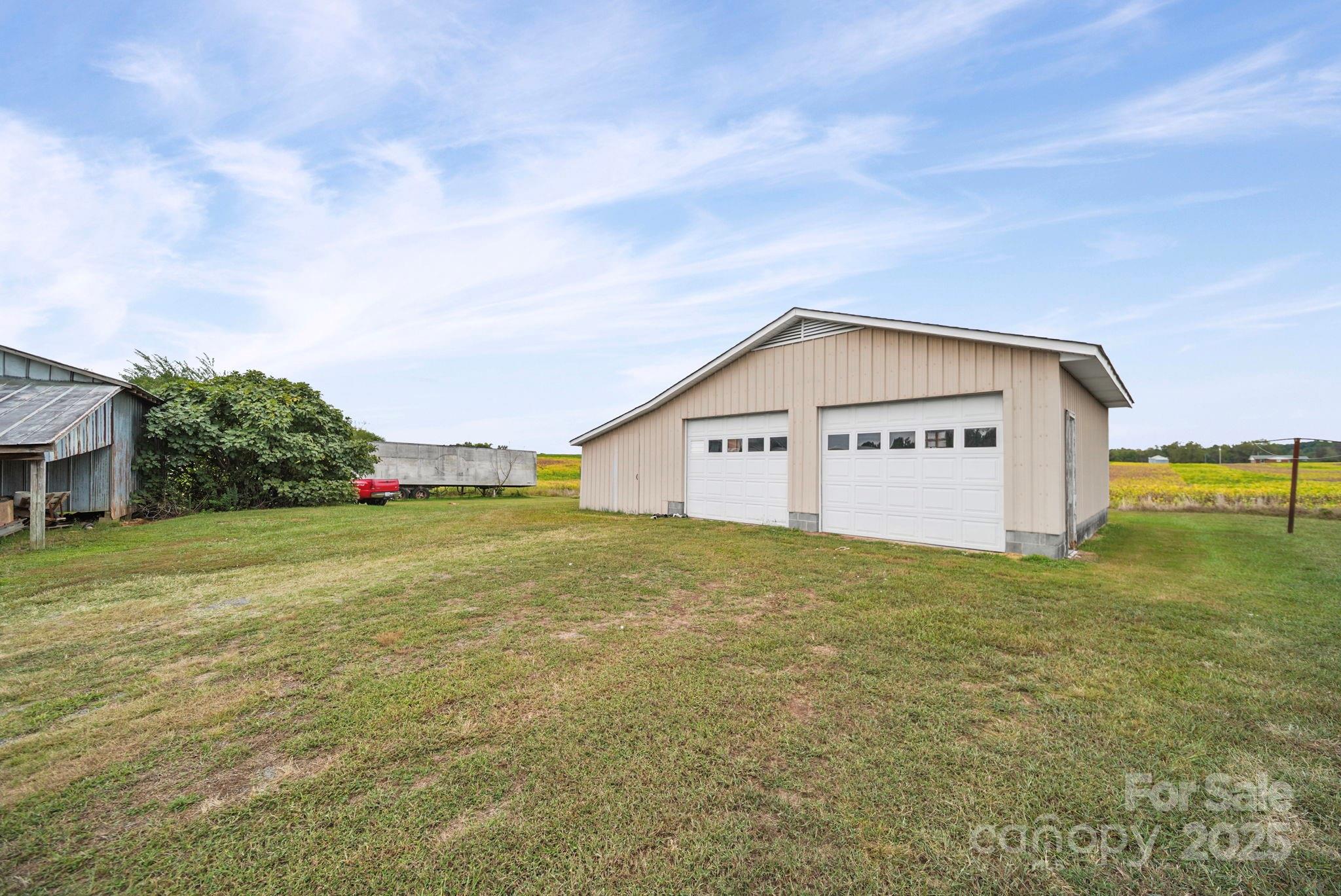3710 Camden Road Marshville, NC 28103 - Photo 9 of 38 a view of a house with backyard and garden