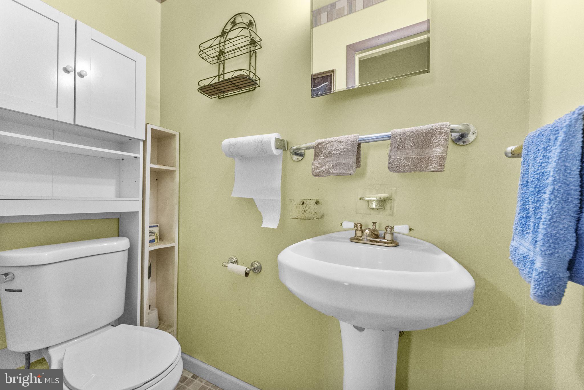 2 Dorset Drive Ewing, NJ 08618 - Photo 21 of 40 a bathroom with a sink a toilet and mirror