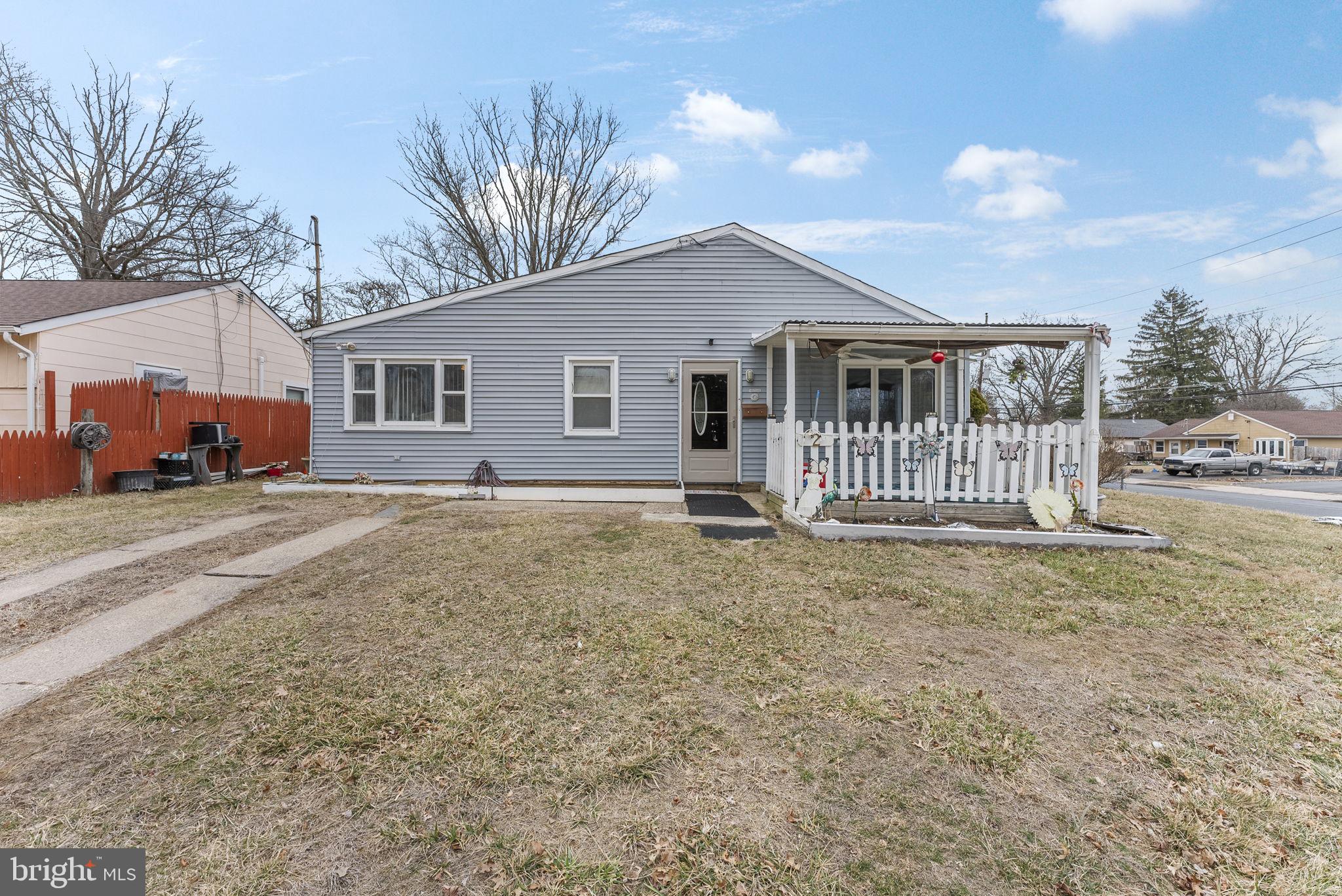 2 Dorset Drive Ewing, NJ 08618 - Photo 25 of 40 a front view of a house with a yard