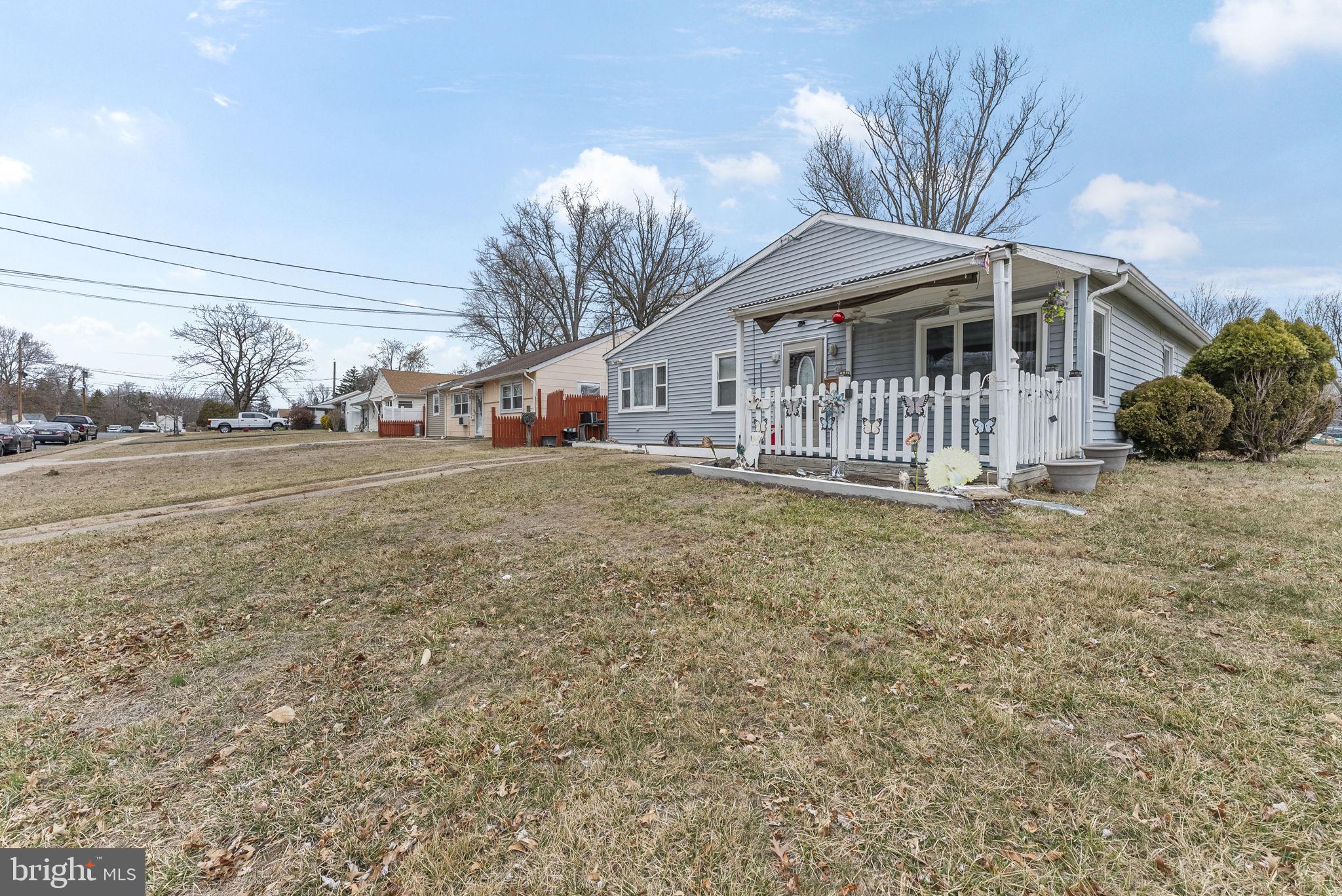 2 Dorset Drive Ewing, NJ 08618 - Photo 27 of 40 a front view of a house with a yard