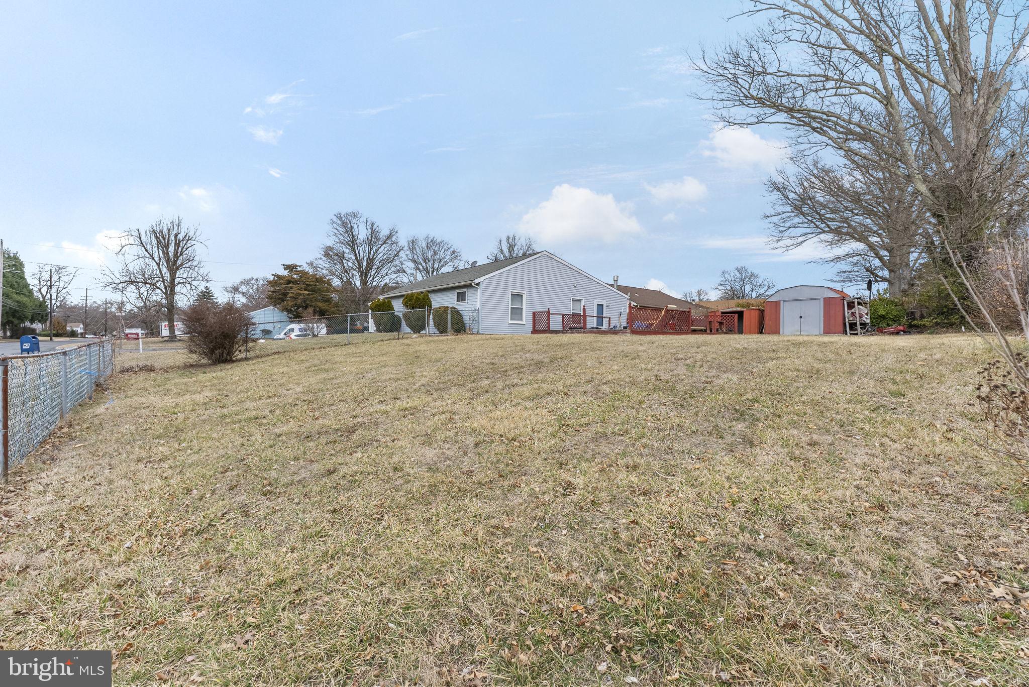 2 Dorset Drive Ewing, NJ 08618 - Photo 31 of 40 a view of a large tree in front of a house