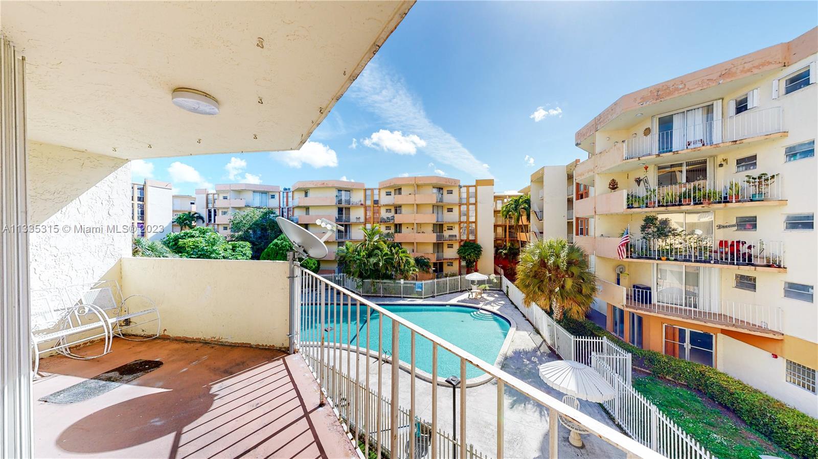 1750 West 46th Street, Unit 312 Hialeah, FL 33012 - Photo 2 of 41 a view of balcony and patio