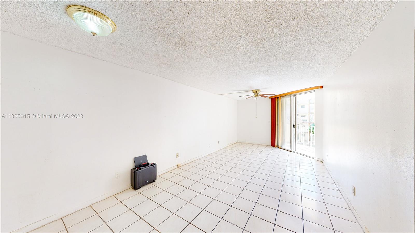 1750 West 46th Street, Unit 312 Hialeah, FL 33012 - Photo 10 of 41 a view of an empty room