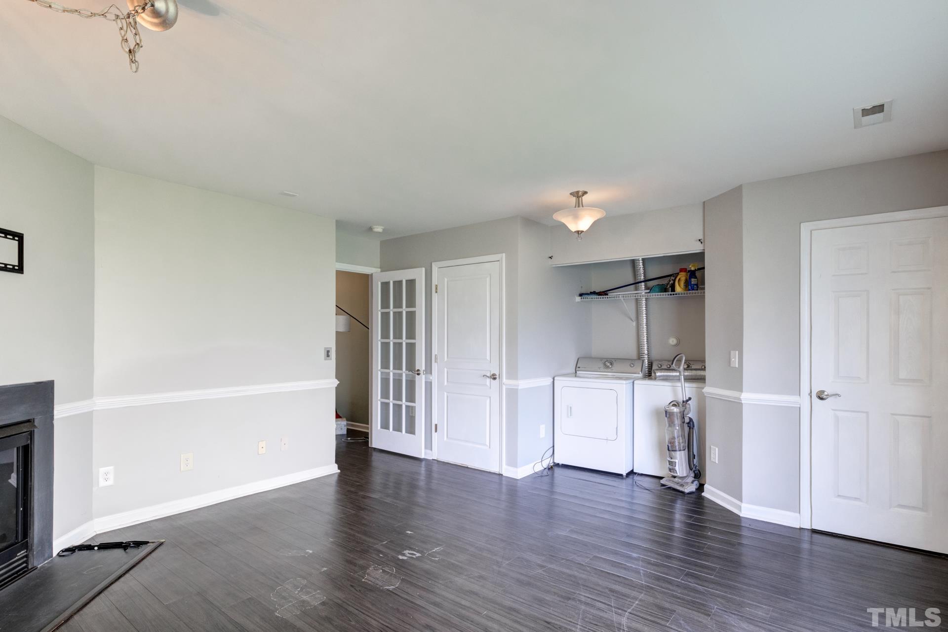 4911 Midstone Lane Raleigh, NC 27610 - Photo 15 of 28 a view of empty room with wooden floor