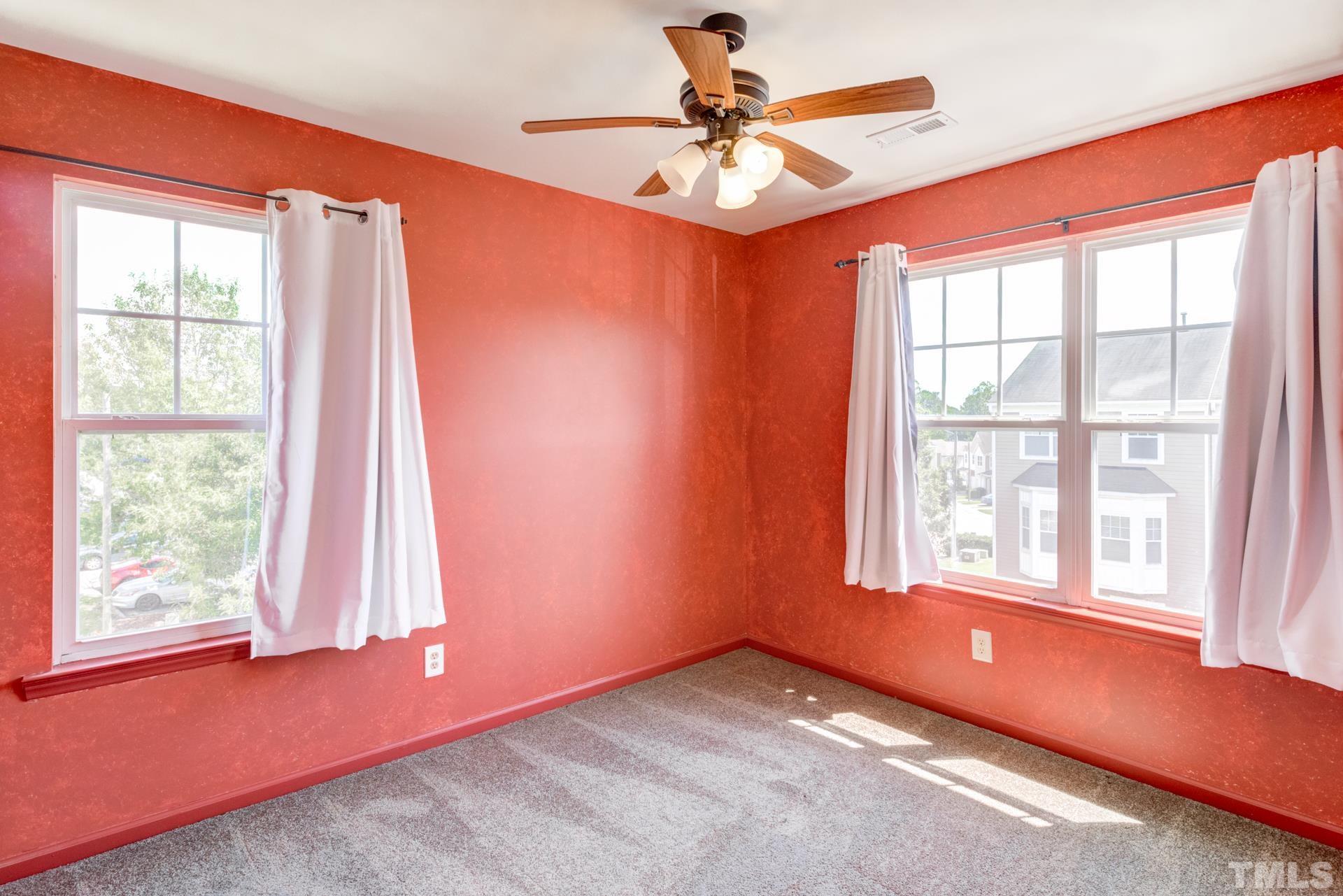 4911 Midstone Lane Raleigh, NC 27610 - Photo 19 of 28 an empty room with a window