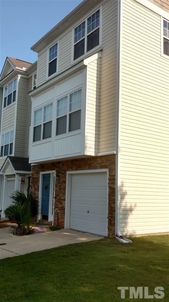 4911 Midstone Lane Raleigh, NC 27610 - Photo 3 of 28 a front view of a house with a yard