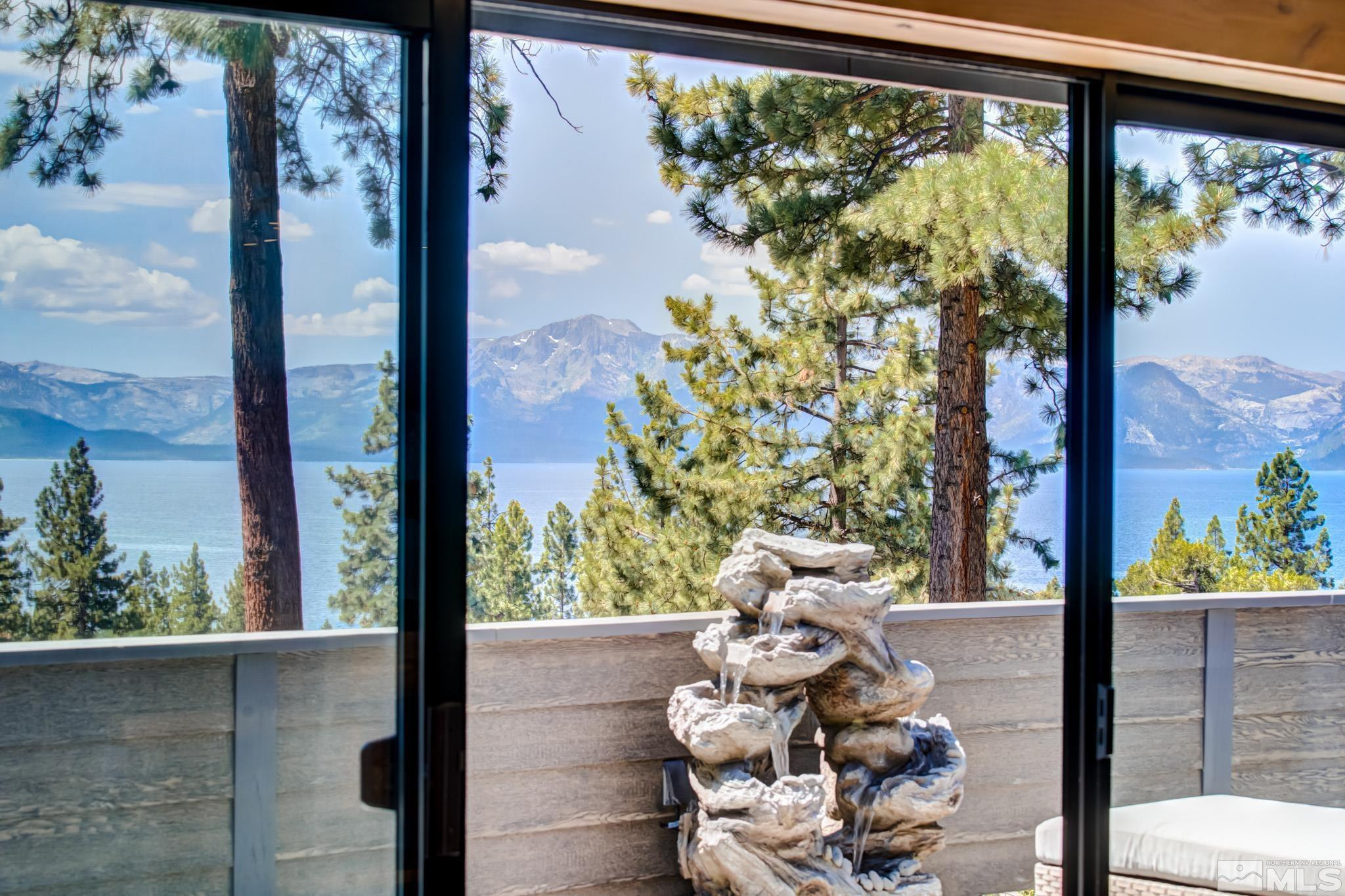 209 Sugar Zephyr Cove, NV 89448 - Photo 13 of 40 a window with yard in back