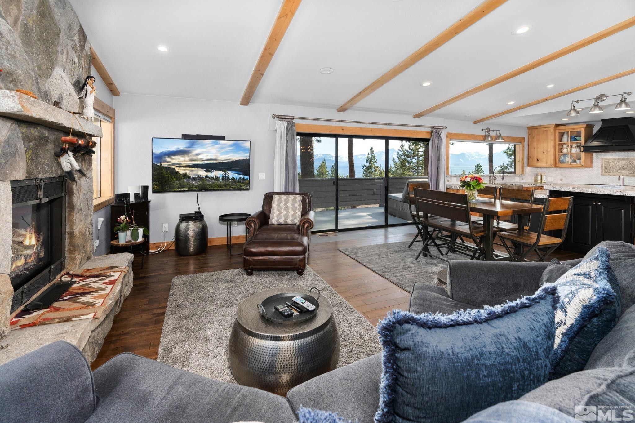 209 Sugar Zephyr Cove, NV 89448 - Photo 16 of 40 a living room with furniture and a flat screen tv