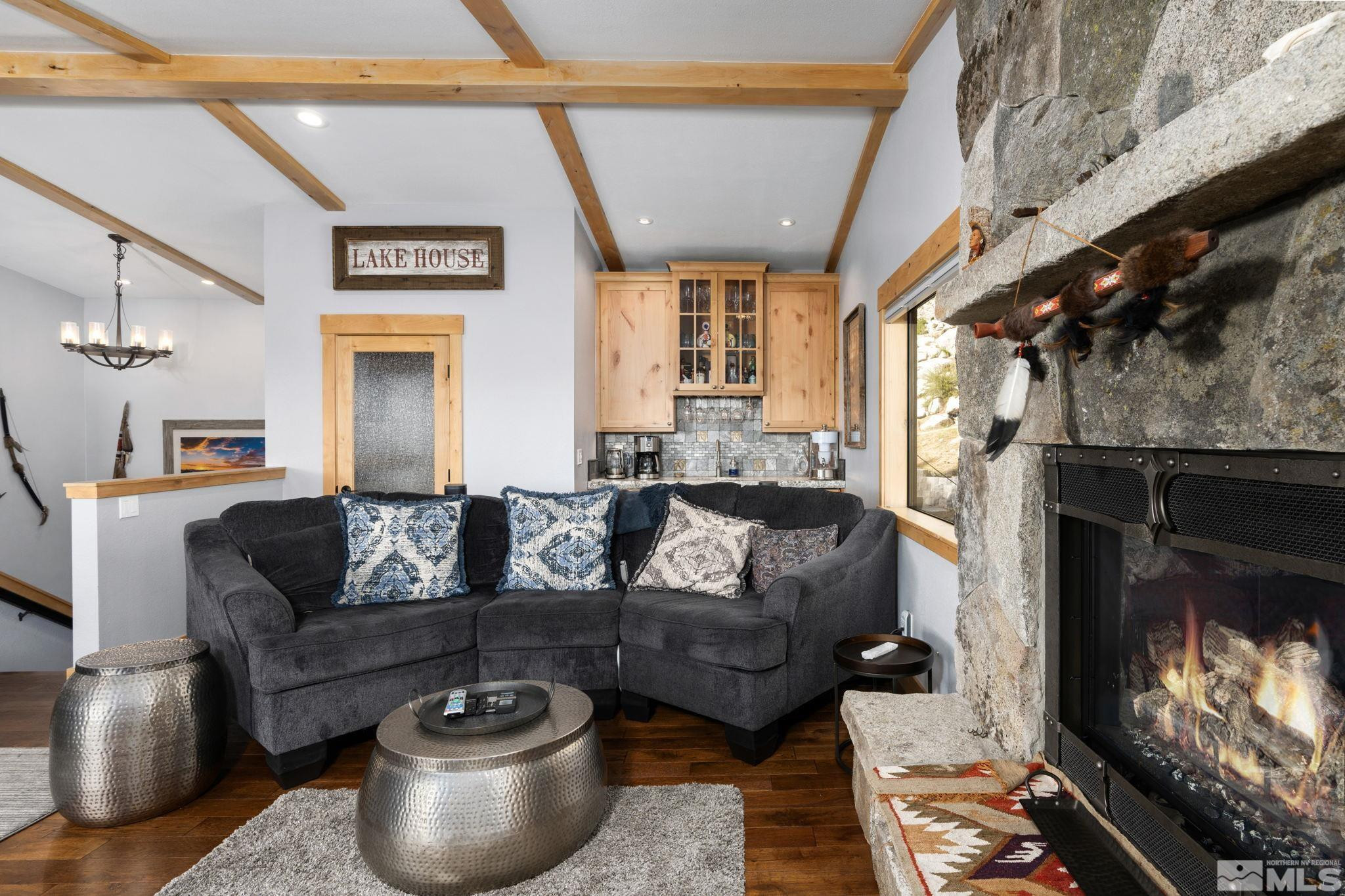 209 Sugar Zephyr Cove, NV 89448 - Photo 17 of 40 a living room with furniture and a fireplace
