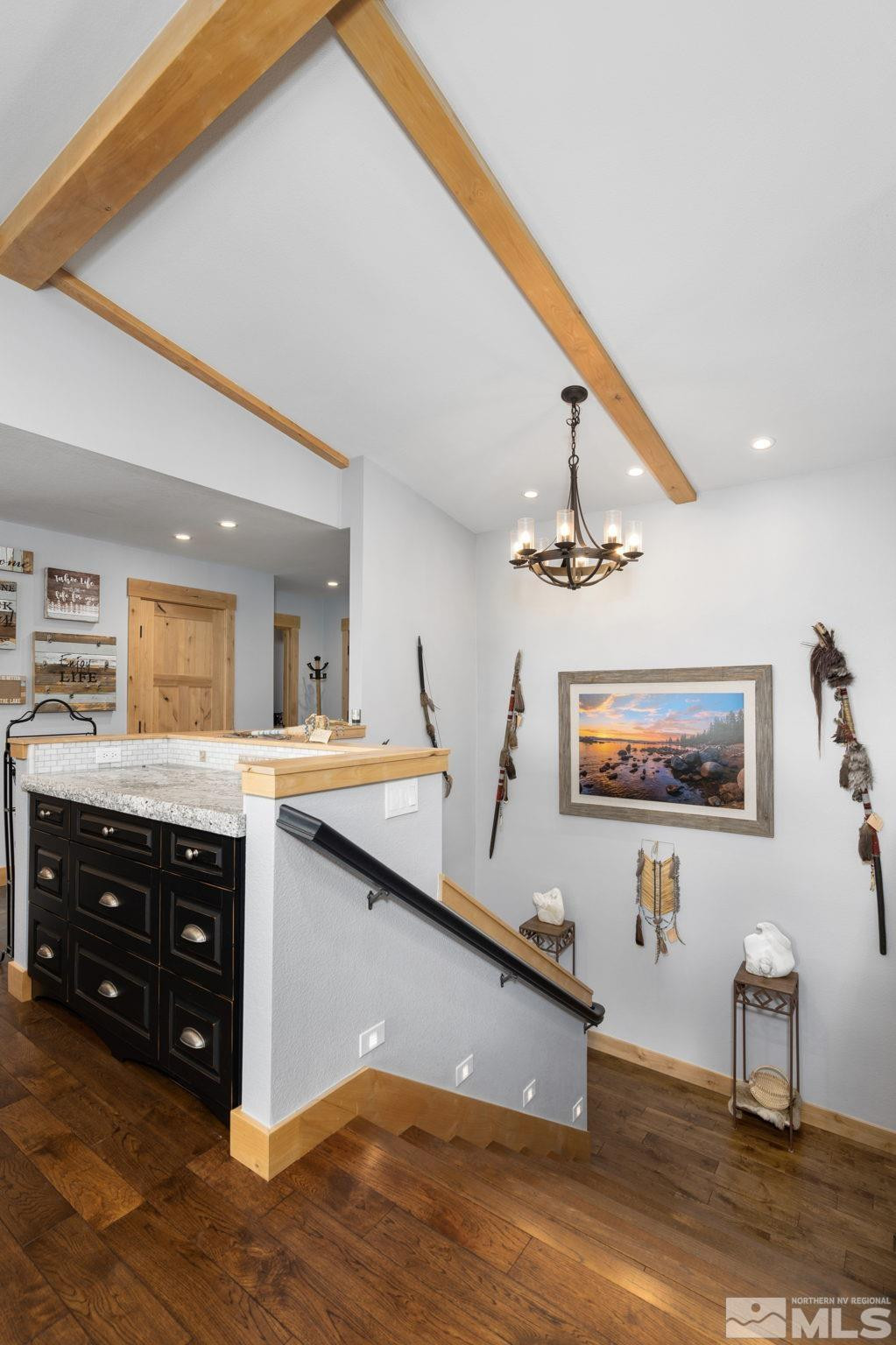 209 Sugar Zephyr Cove, NV 89448 - Photo 24 of 40 a kitchen with wooden cabinets and a sink