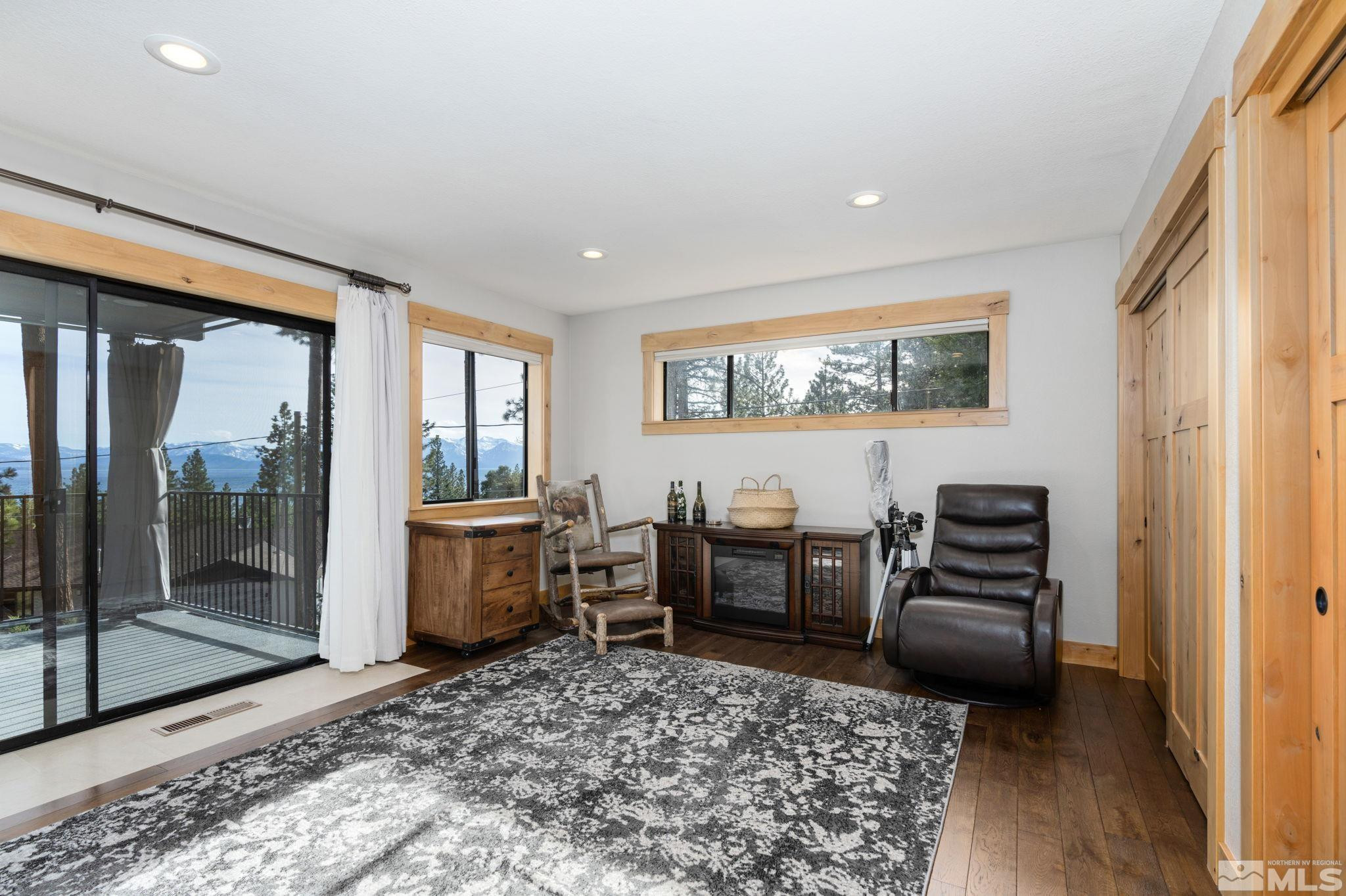 209 Sugar Zephyr Cove, NV 89448 - Photo 33 of 40 a view of a livingroom with furniture wooden floor and window