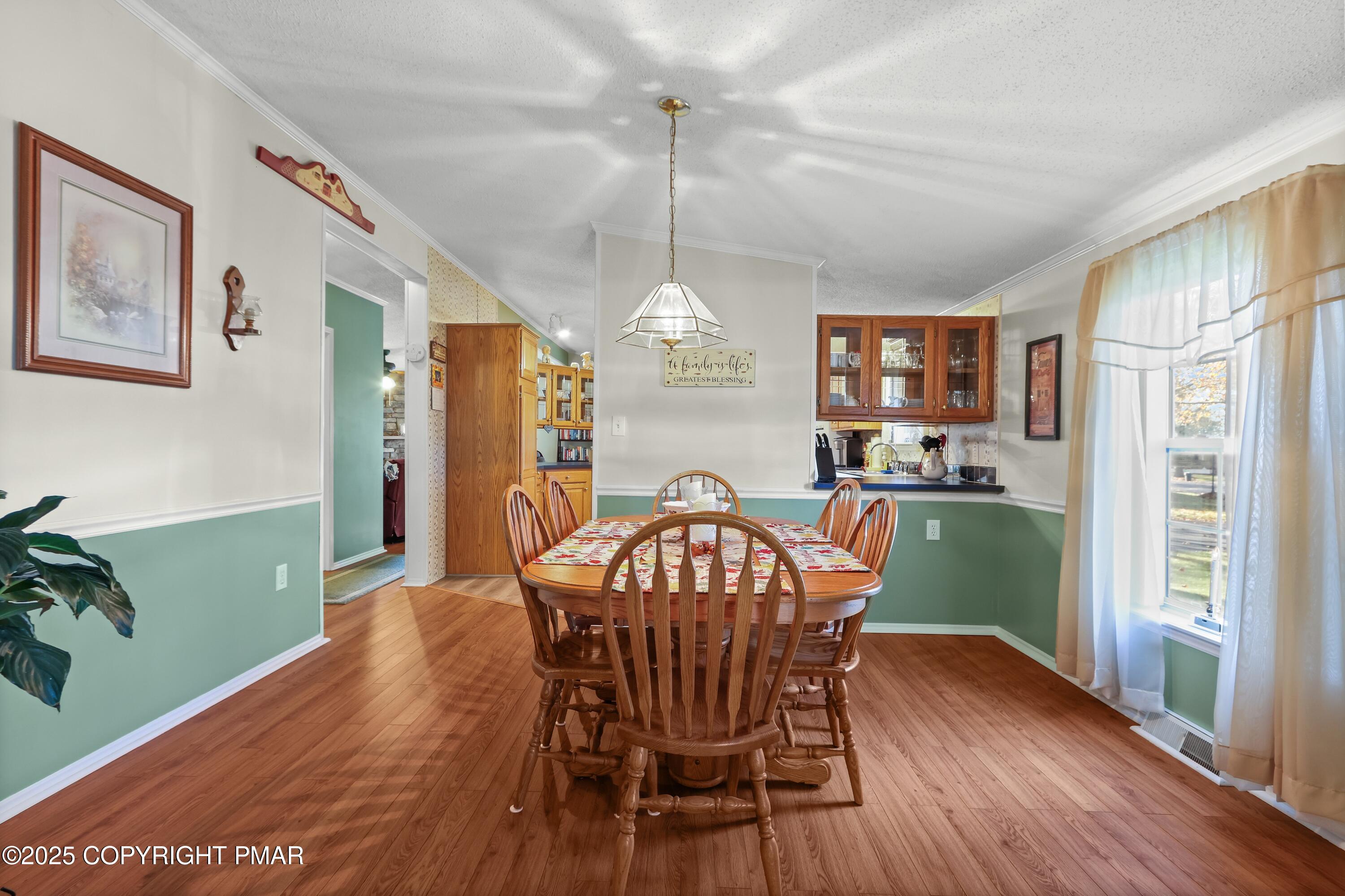 8 Cedar Court Bath, PA 18014 - Photo 11 of 35 a view of a dining room with furniture window and wooden floor