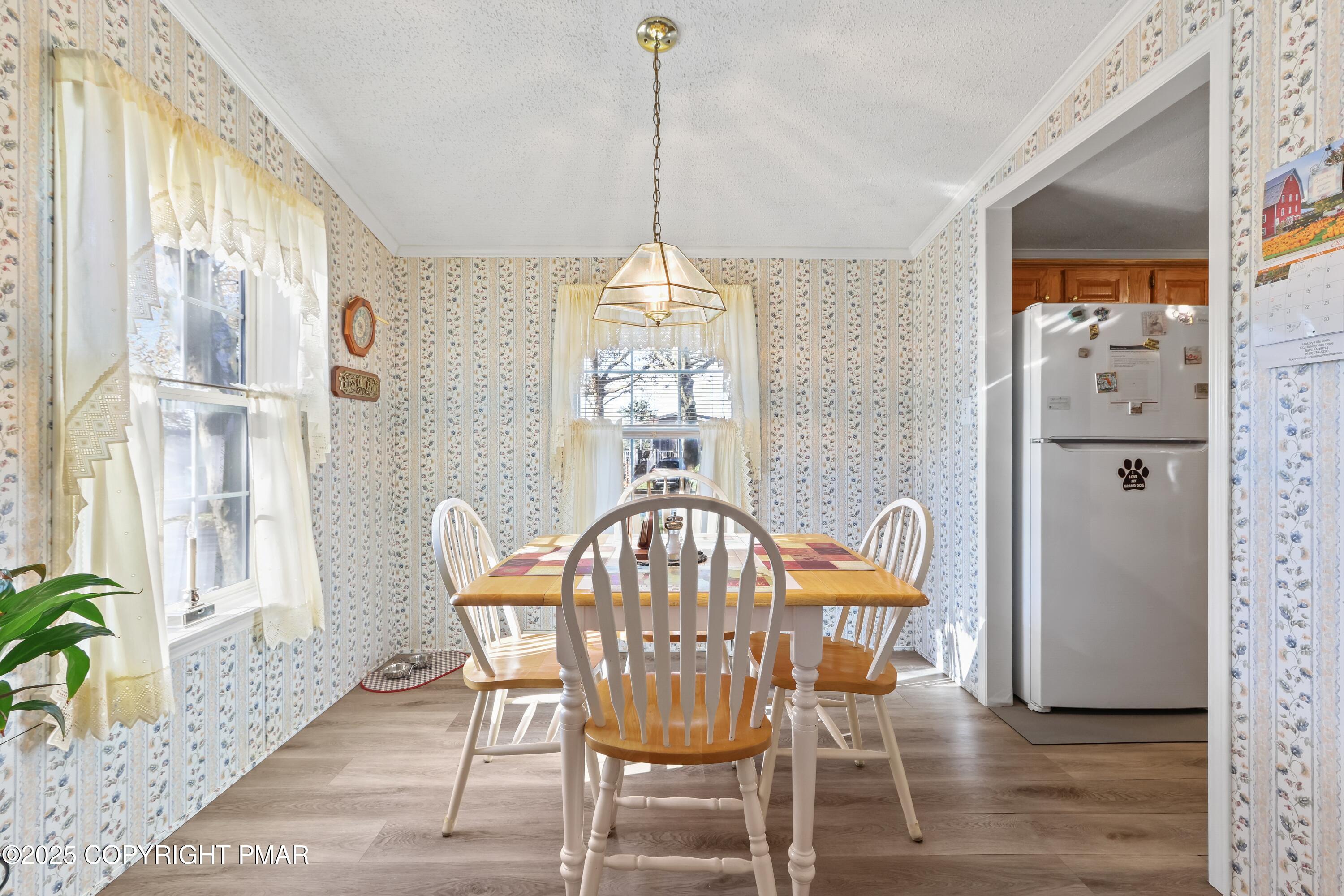 8 Cedar Court Bath, PA 18014 - Photo 16 of 35 a view of a dining room with furniture window and wooden floor