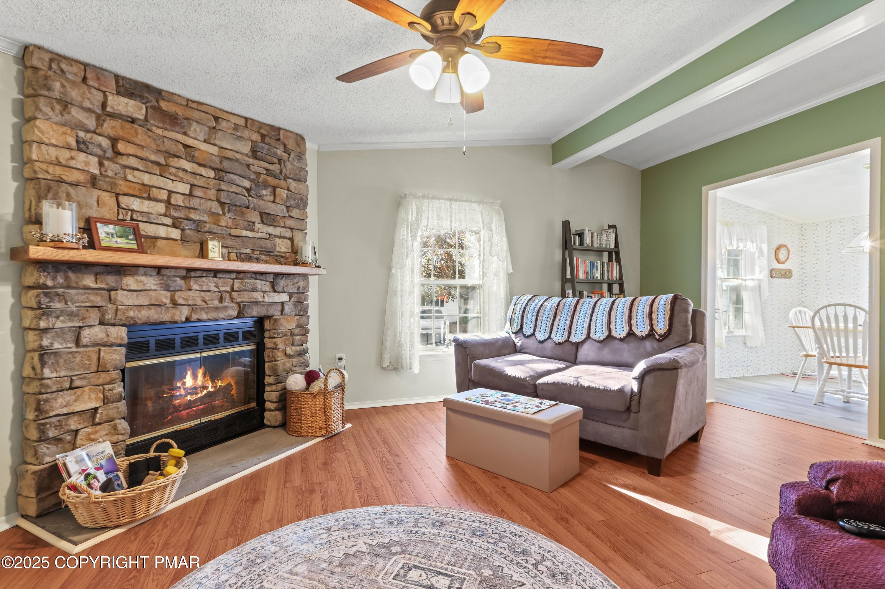 8 Cedar Court Bath, PA 18014 - Photo 17 of 35 a living room with furniture and a fireplace