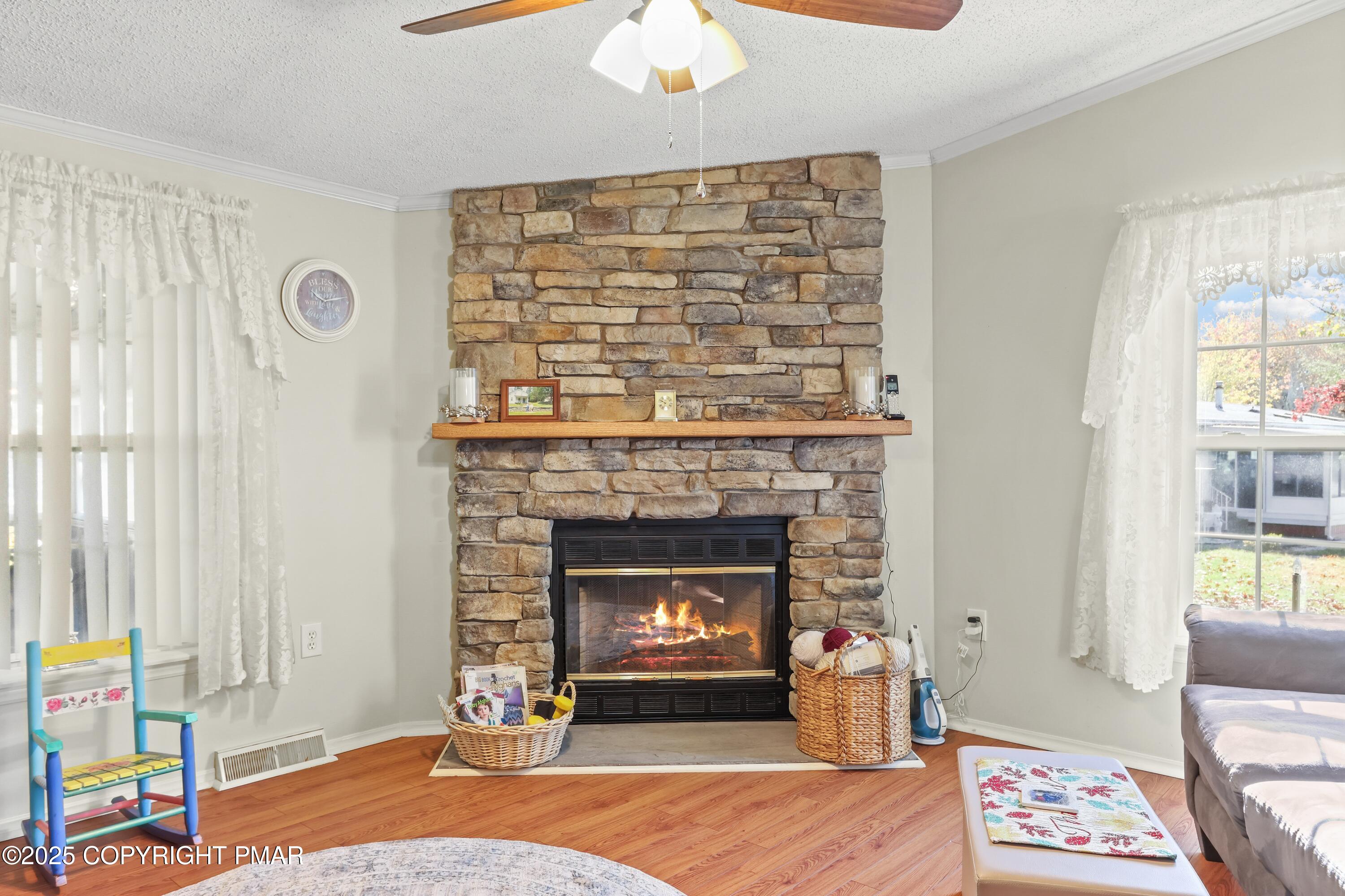 8 Cedar Court Bath, PA 18014 - Photo 18 of 35 a living room with furniture and a fireplace