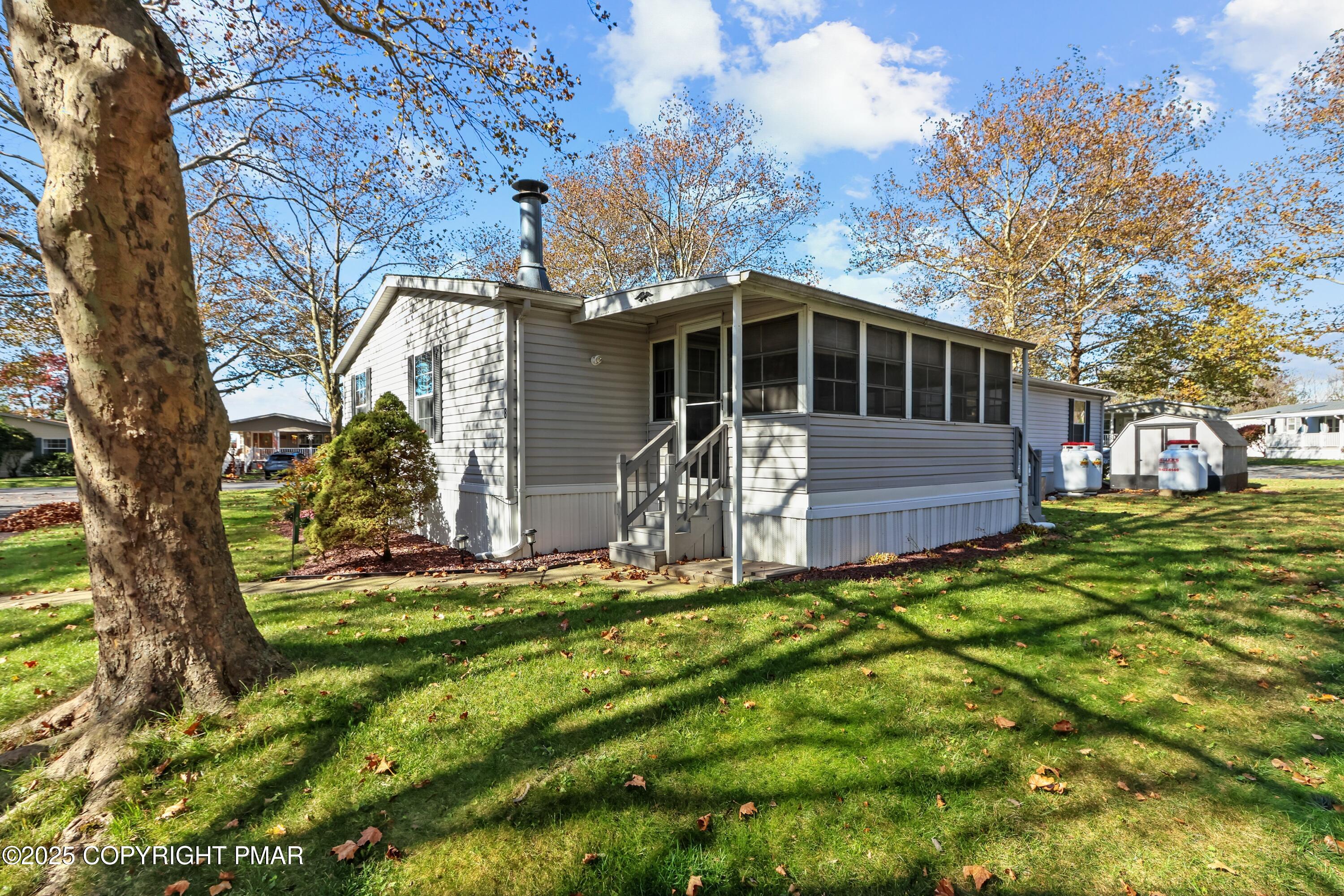 8 Cedar Court Bath, PA 18014 - Photo 3 of 35 a front view of a house with a yard