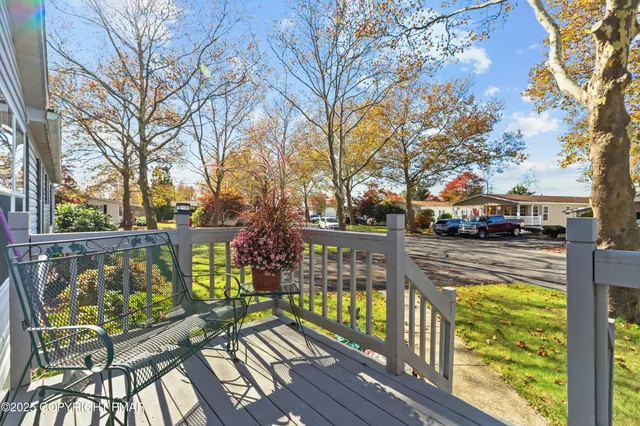 a view of swimming pool with seating