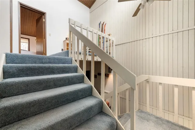 a view of a livingroom with furniture and a window