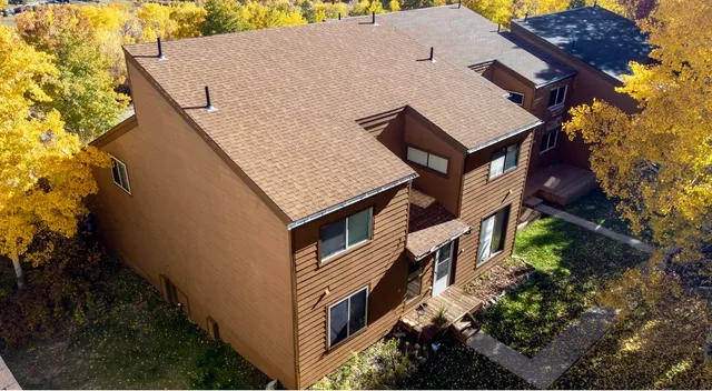 a front view of a house with a garage