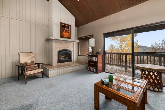 a view of a livingroom with furniture and a table