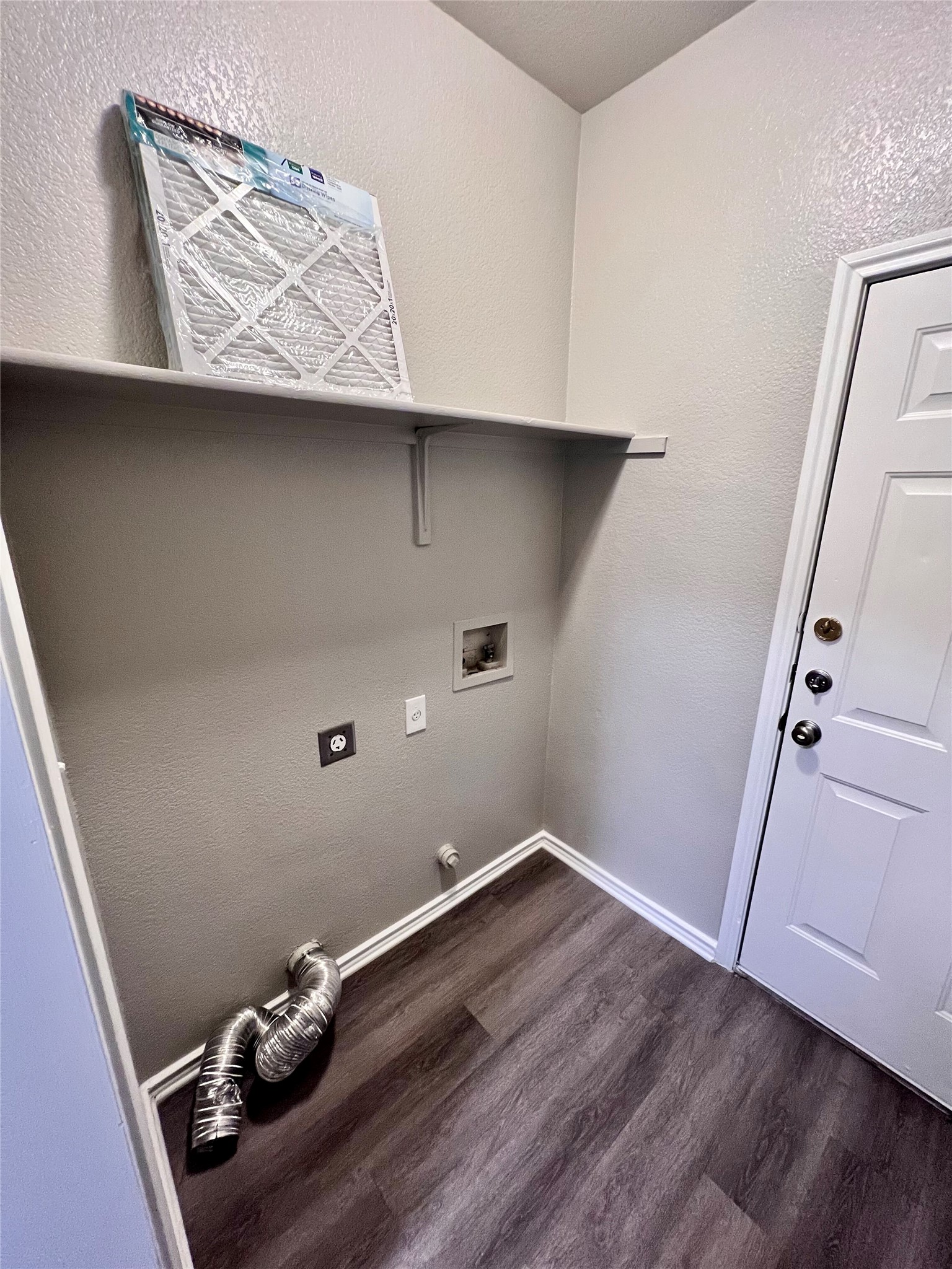 1801 Constantino Circle Austin, TX 78745 - Photo 7 of 22 a room with a wooden floor and white wall