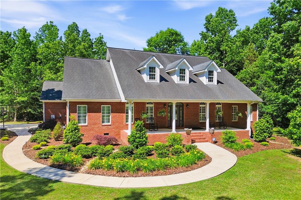 front view of a house with a yard
