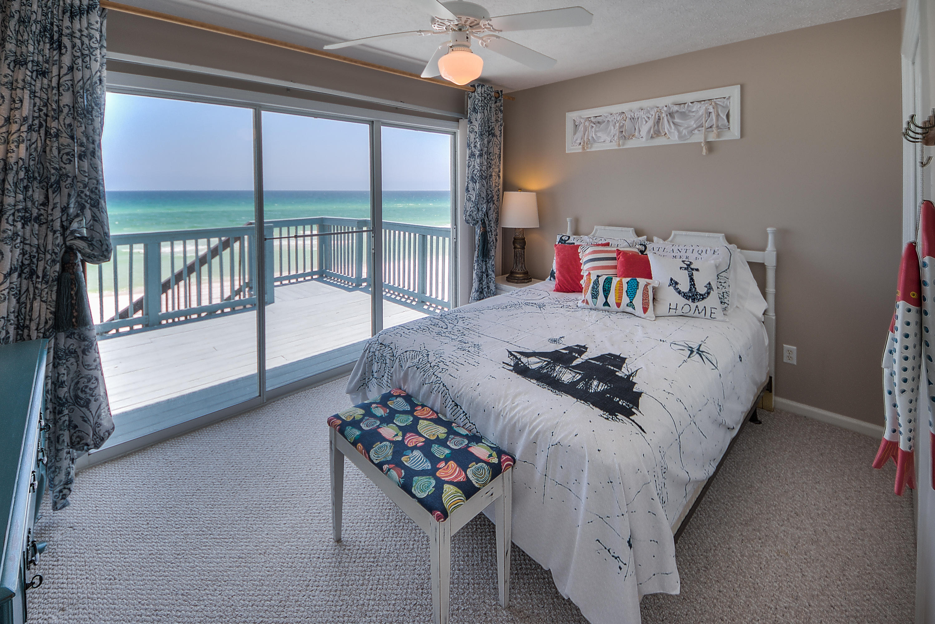 75 Fort Panic Road Santa Rosa Beach, FL 32459 - Photo 12 of 24 a bedroom with a bed and a large window