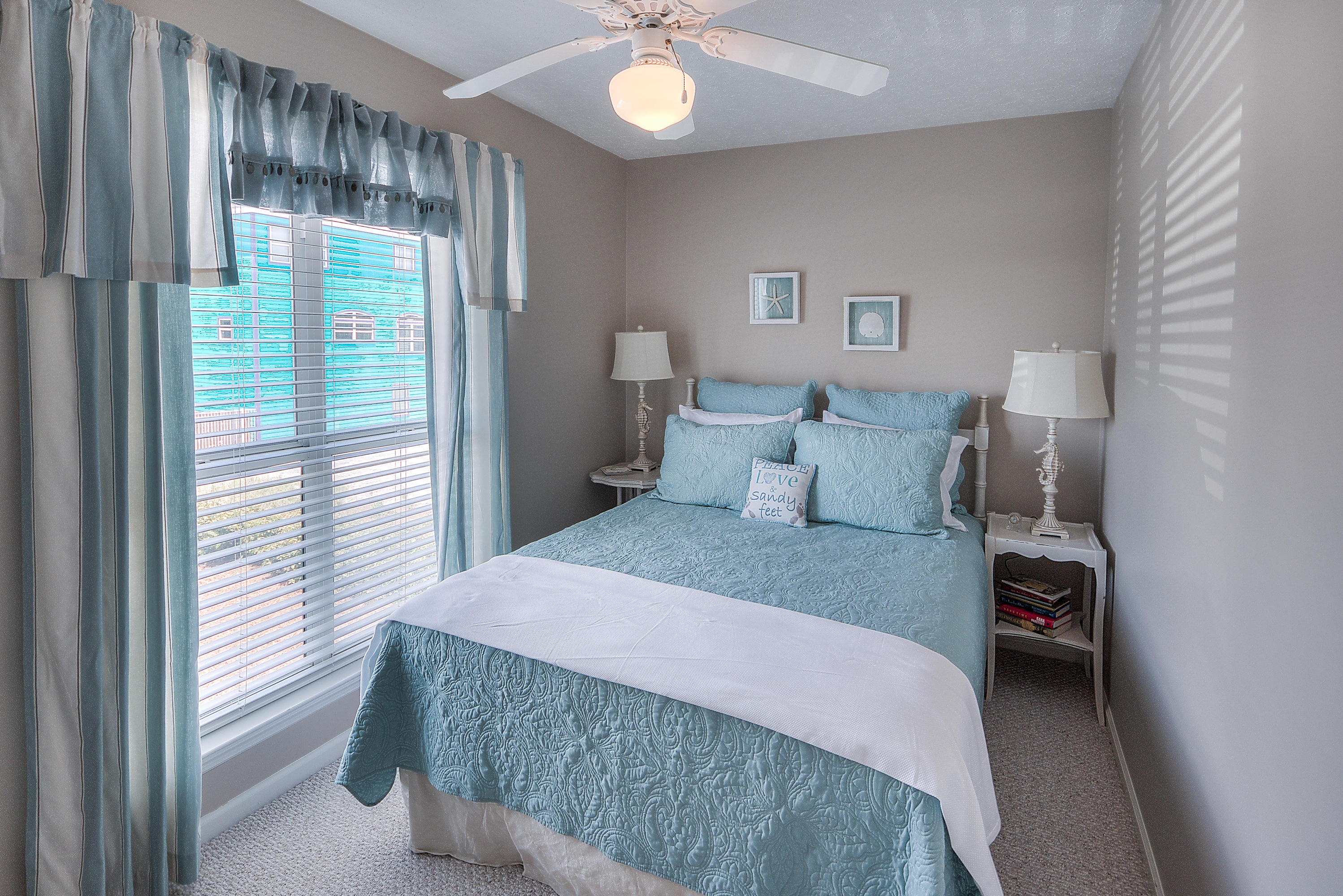 75 Fort Panic Road Santa Rosa Beach, FL 32459 - Photo 13 of 24 a bedroom with a bed and a large window
