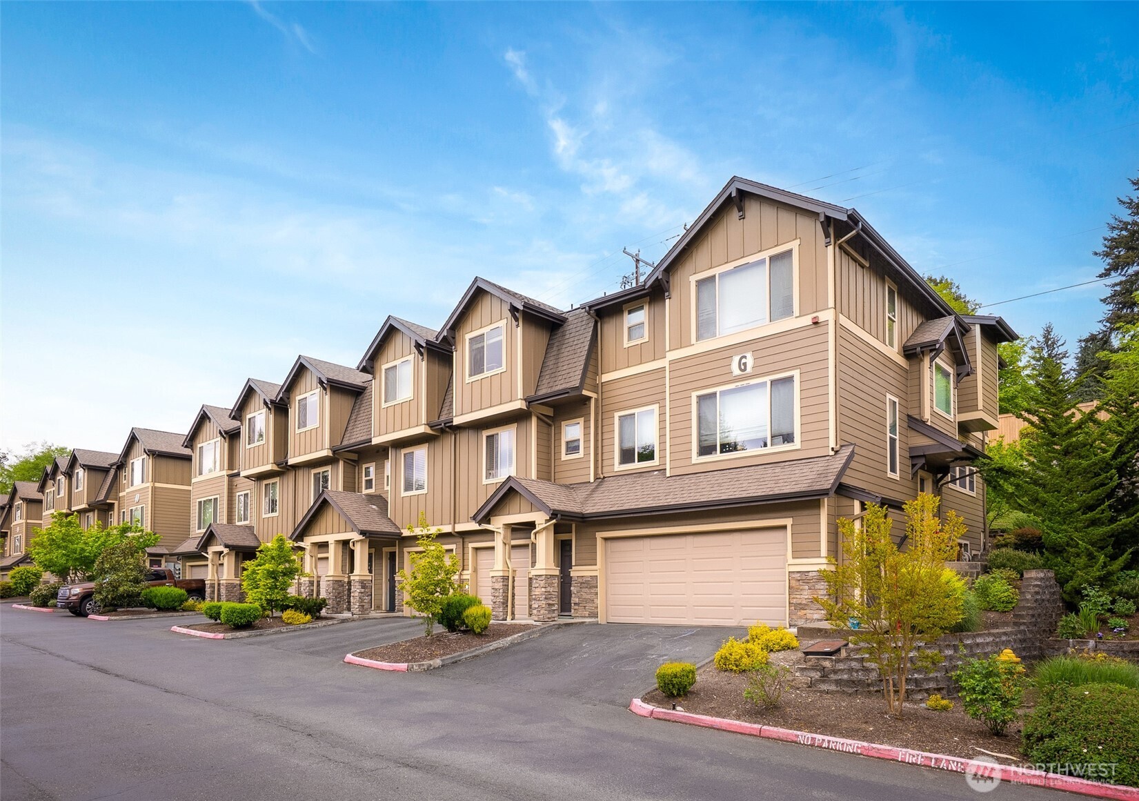 1900 Weaver Road, Unit G103 Snohomish, WA 98290 - Photo 16 of 17 a view of multiple houses with a street