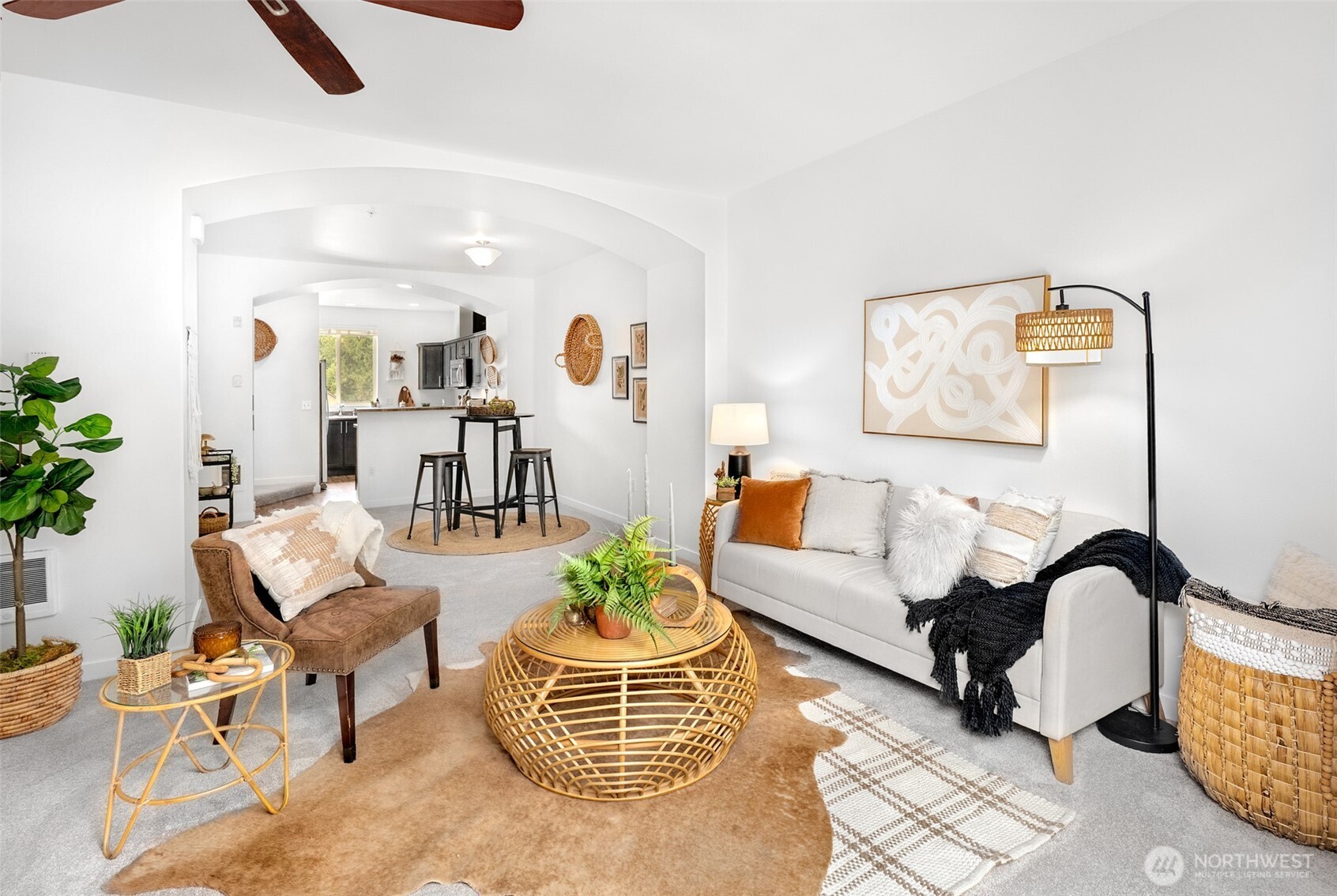 1900 Weaver Road, Unit G103 Snohomish, WA 98290 - Photo 2 of 17 a living room with furniture a rug and white walls